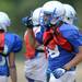 Lincoln sophomore Tyler Mabry celebrates after scoring a touchdown during a practice play at the school on Thursday. Melanie Maxwell I AnnArbor.com
